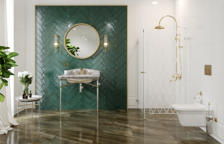 Canakkale ceramic moonlight green metro tile herringbone flooring, luxury and gold detailed bathroom, gold sink mixer, gold framed bathroom sink over mirror