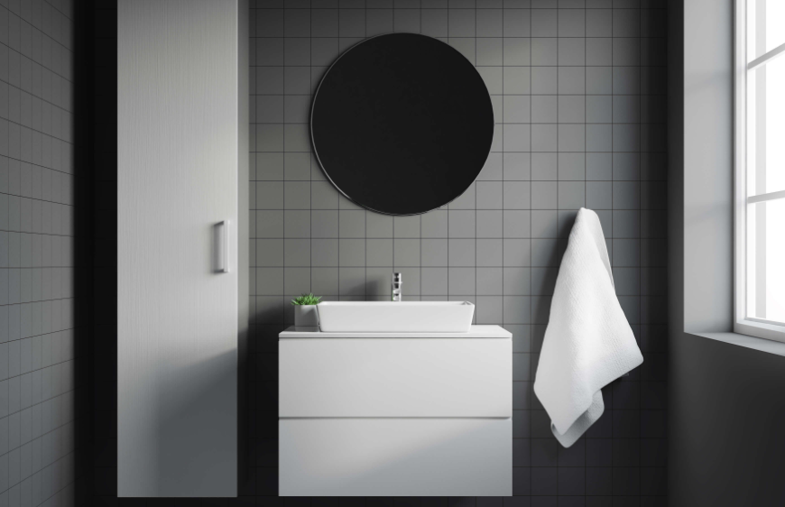 siyah beyaz banyoda lavabo alti cekmeceli dolap ve beyaz boy dolabi
