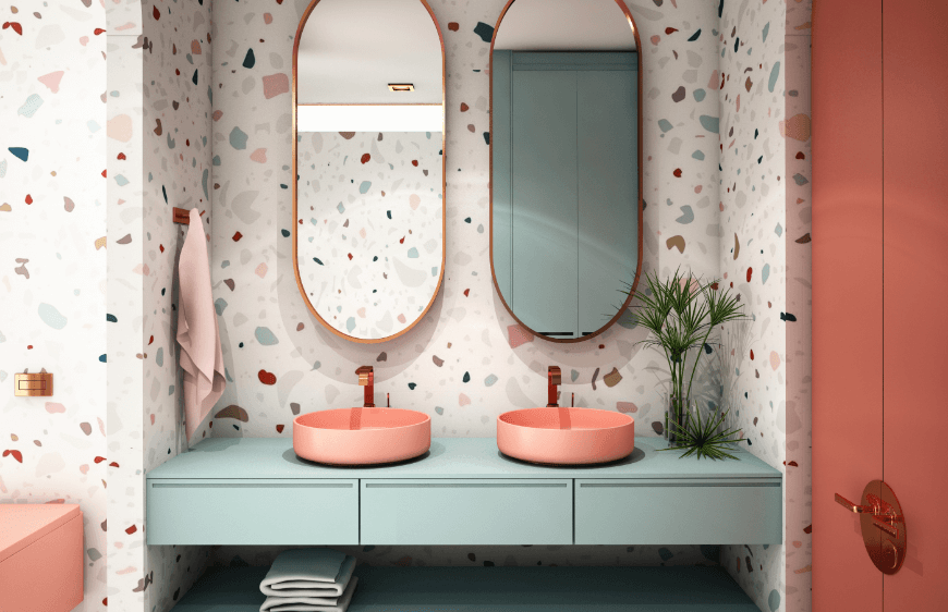 terrazzo banyo duvari, su yesili banyo dolabi, seftali pembe rengi canak lavabo, banyoda ikiz lavabo, modern bronz cerceveli uzun elips ayna