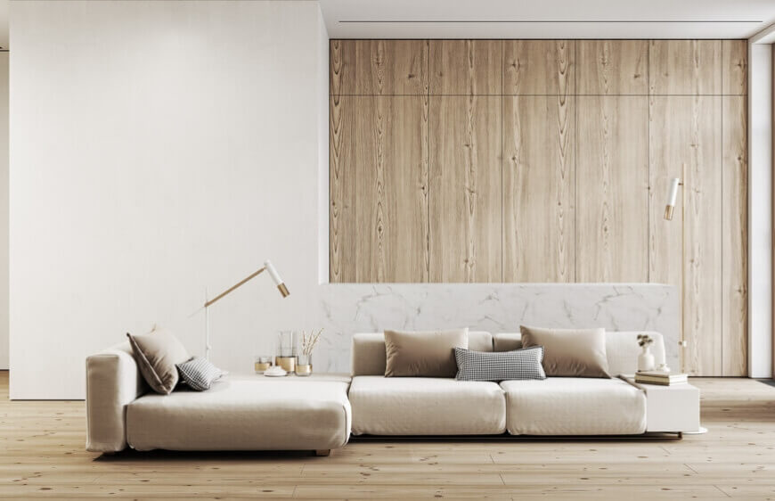 modern minimalist kanepe, ahsap zemin ve ahsap duvar panelleri, mermer mutfak adasi kaleseramik t one