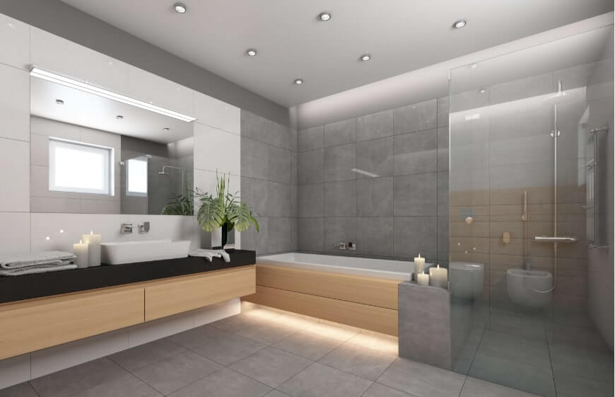 gri ve ahsap tonlarda tasarlanan modern stil banyoda brut beton gorunumlu duvar ve karo seramikleri