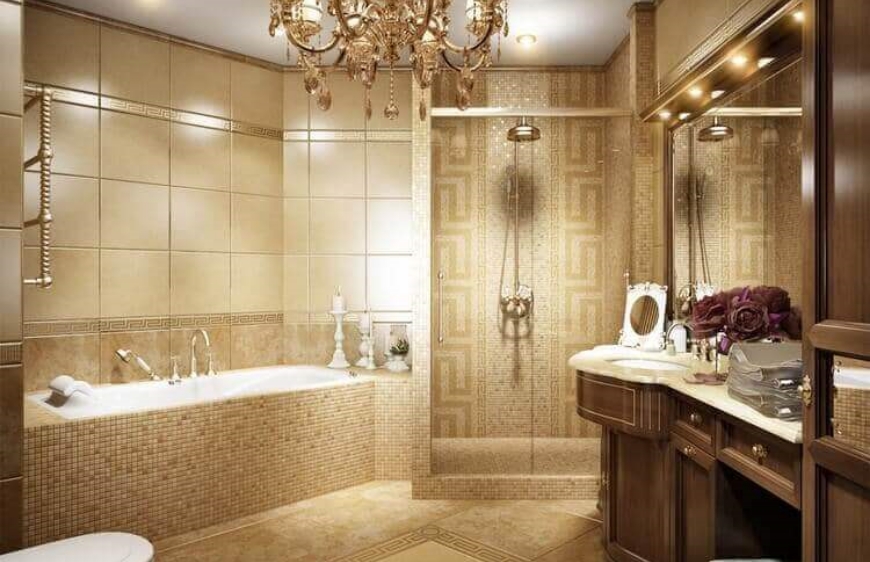 gosterisli ve parlak altin tonlarinin, detaylarin, malzeme ve motif ceistliliginin yer aldigi barok klasik banyo tasarimi